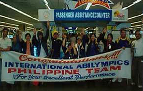 Filipino delegates are greeted at the NAIA terminal.