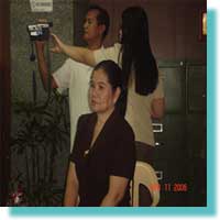 Ms. Nelia De Jesus, listen while the NCWDP Director spoken.