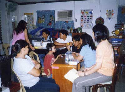 Jerome Bobis tries to test if he is ok in hearing activity.