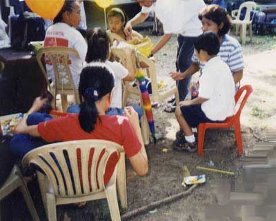 Parents and children sharing their foods.