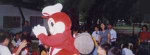 Children enjoying play with Jollibee. 