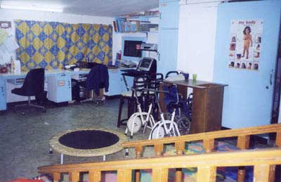 stutionary bike, walker, wheelchair for patient with lower extremities disability. 